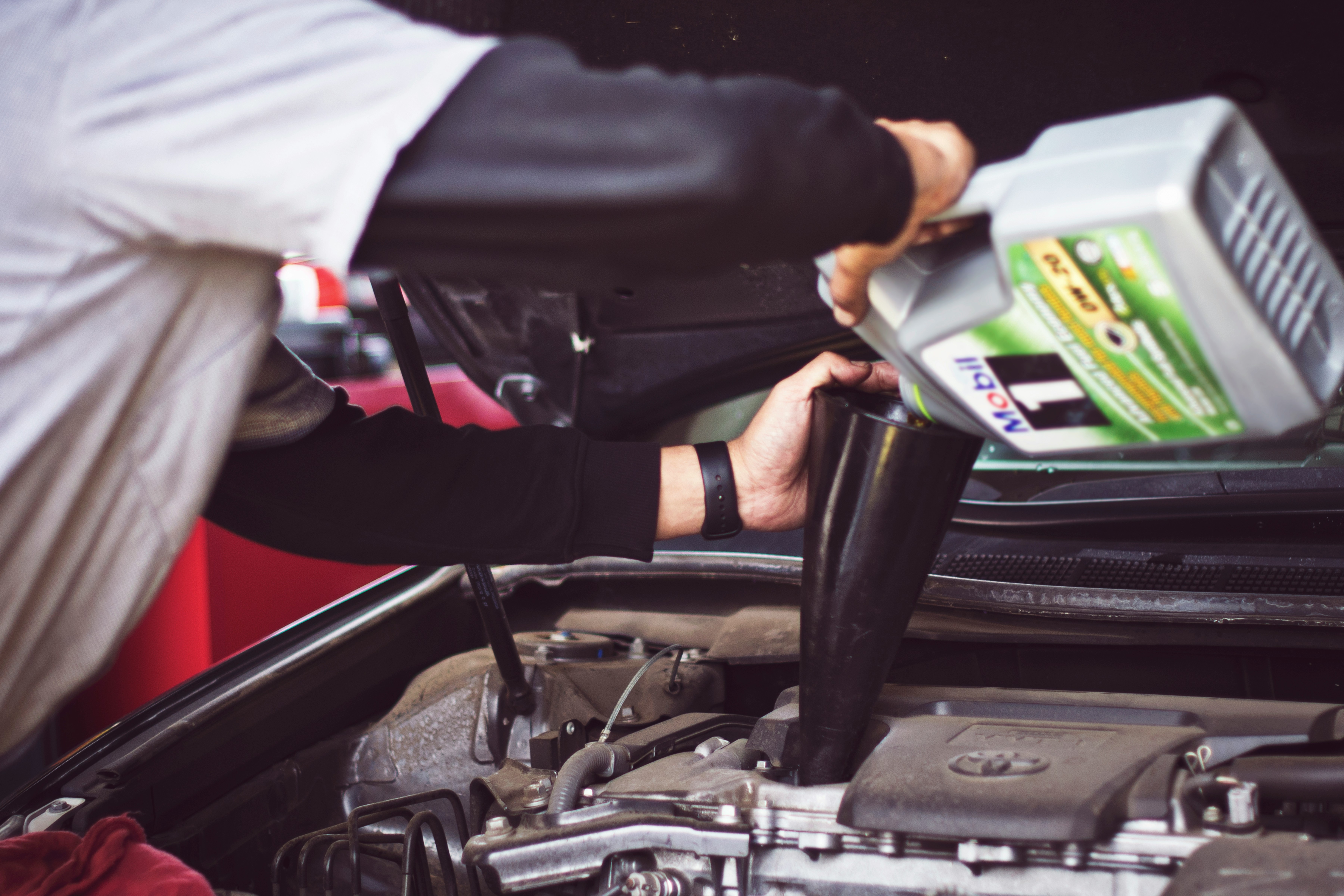 Auto repair shop interior with tools and work areas